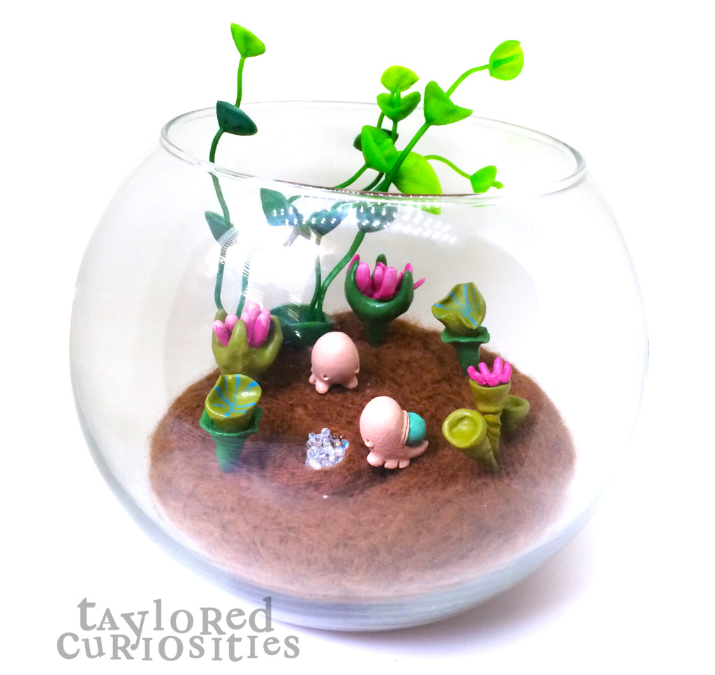 taylored curiosities spriggledop snail terrarium designer toy plants green okemordyn resin handmade copyright protected 8